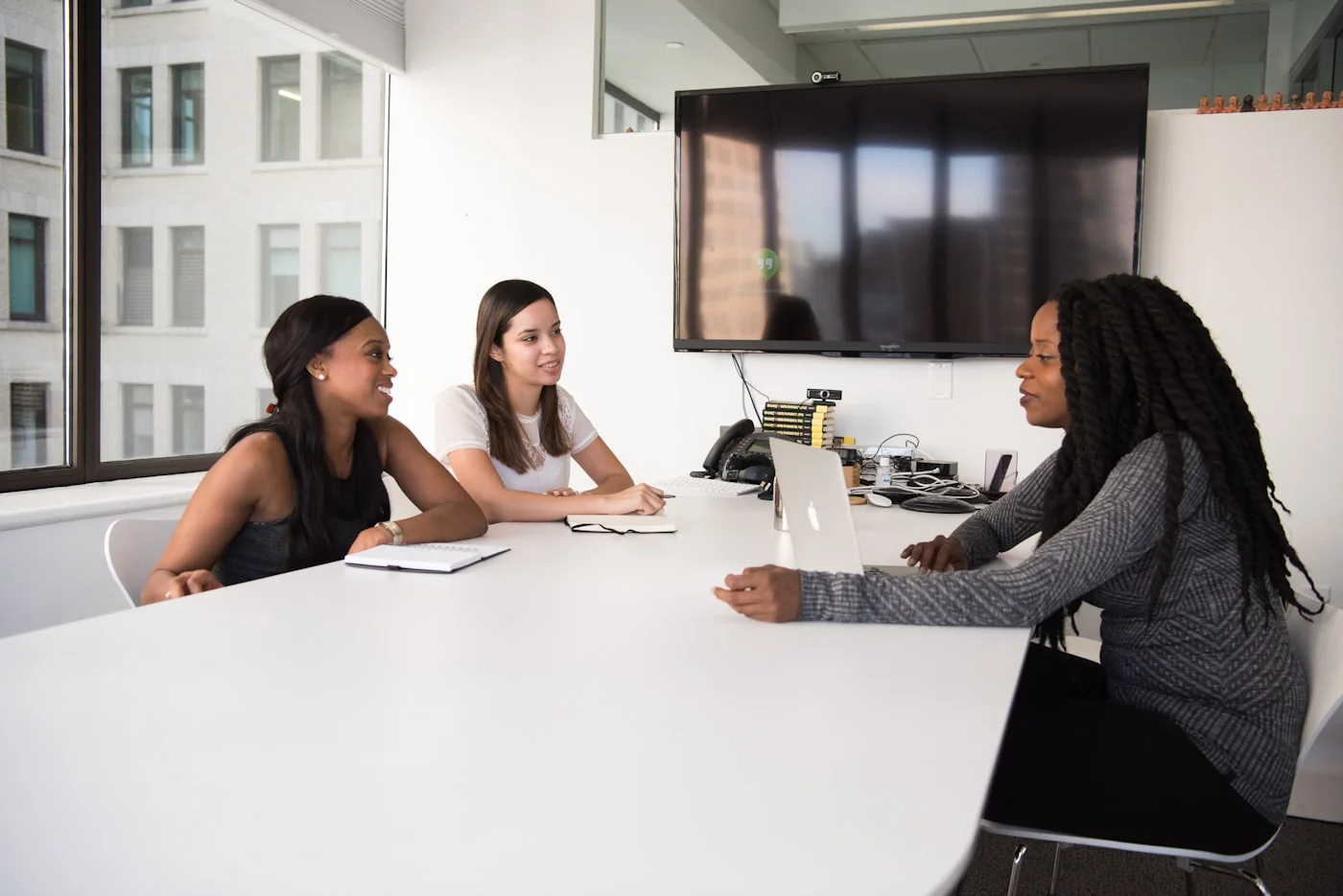 Colleagues reviewing information together at a table